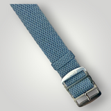 Grey woven watch strap with silver buckle on a light gray background