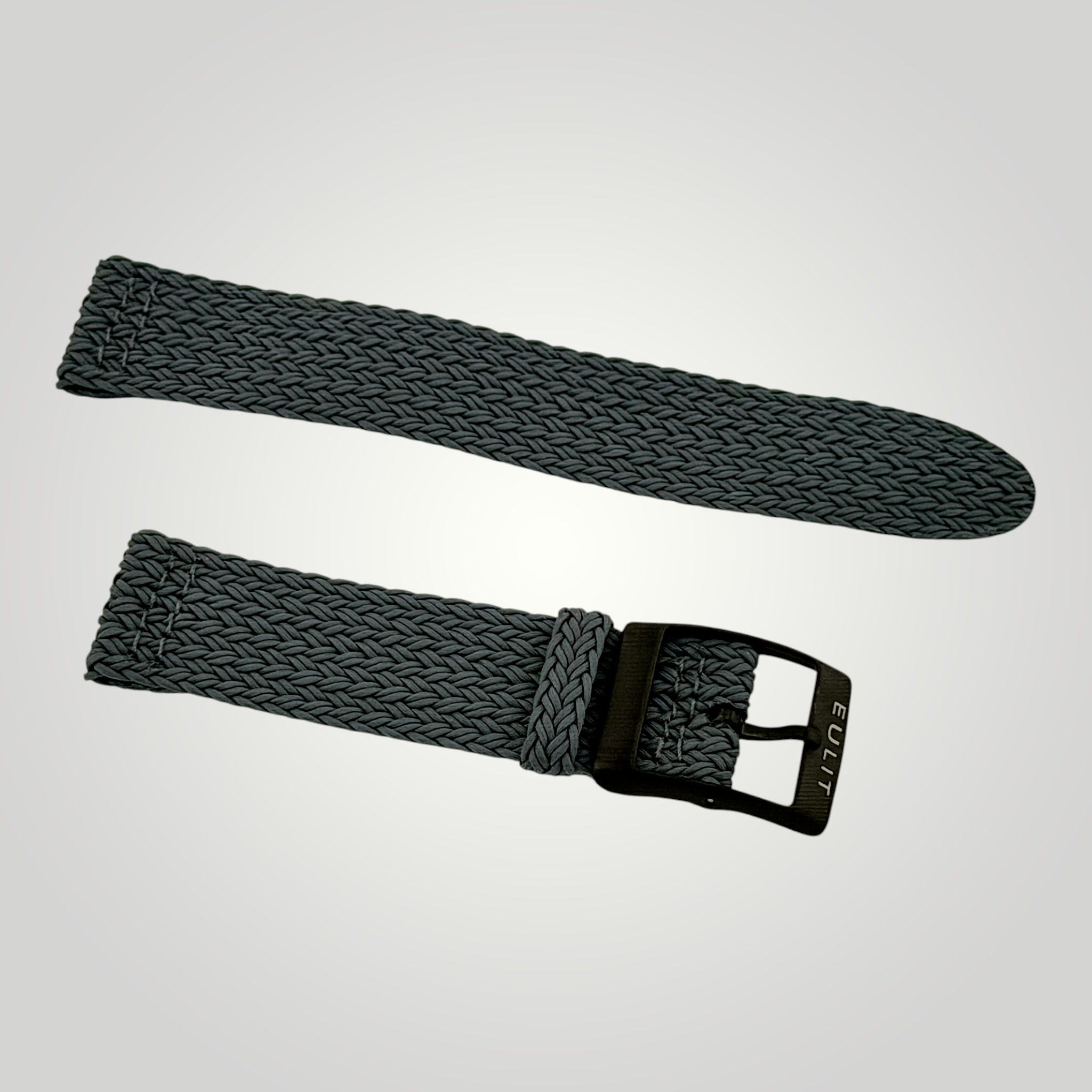 Black braided watch strap with a buckle on a light gray background