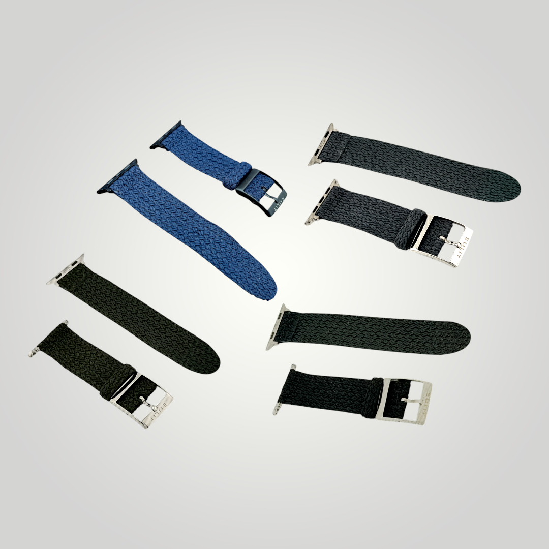 Set of various watch straps on a light gray background