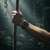 Hand holding a rope with a forest background