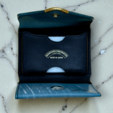 IKENOHATA GINKAWATEN 池之端銀革店 | Cramp UK Bridle Leather Compact Wallet with Front Hardware | TEAL